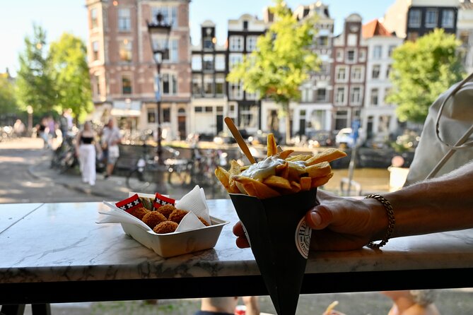 10 Tastes of Amsterdam: Food Tour by UNESCO Canals and Jordaan - Puccini Bomboni Chocolate Stop: Dutch Pralines and Cacao Pride