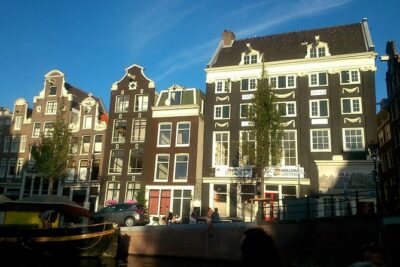 1,5 hours Amsterdam Rickshaw Tour - The UNESCO Canal Ring From the Road and Bridge Openings