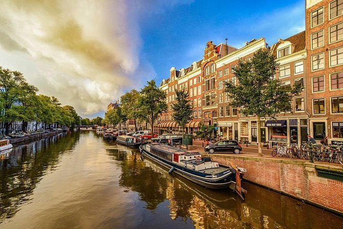 Airport Transfer: Schiphol Airport AMS to Amsterdam by Luxury Van - Group Travel Reality: Up to Six, and What About Larger Parties