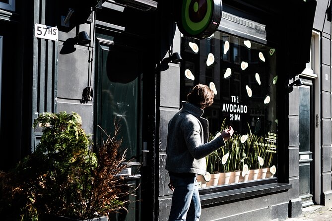 Amstagram Tour & Moco Experience - Spui square and Bloemenmarkt: end with icons you can keep exploring