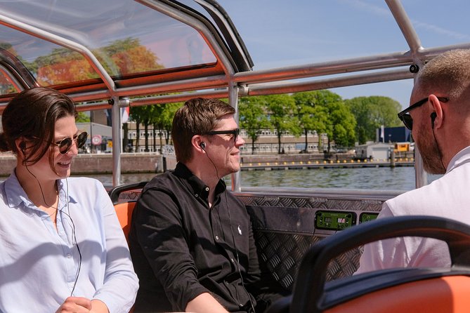 Amsterdam 1h Canal Cruise by Semi-Open Boat with Audio Guide - Semi-open views: how to make the most of bridge moments