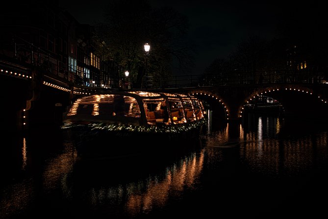 Amsterdam 2-Hour Evening Cruise With Live Guide and Bar - Passing Anne Frank House and spotting what matters from the water