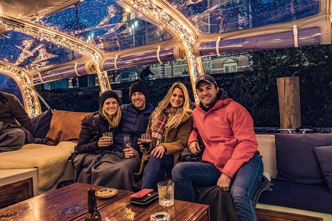 Amsterdam 2-Hour Evening Cruise With Live Guide and Bar - Grand church sightlines and the Amstel beer connection