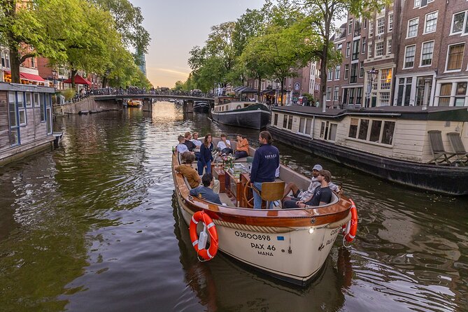 Amsterdam 2 Hour Small-Group Canal Cruise with Dutch Snacks & Bar - When the Bar, Commentary Style, and Weather Matter