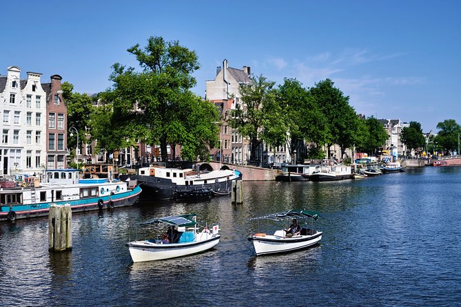 Amsterdam: 60-Minute Guided Private Canal Cruise with Drinks - Prinsengracht and the Anne Frank House: A Different Vantage