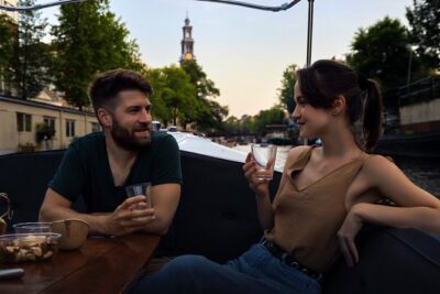 Amsterdam: 60-Minute Guided Private Canal Cruise with Drinks - Jordaan Canals: The Quieter Amsterdam Lesson