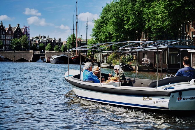 Amsterdam: 60-Minute Guided Private Canal Cruise with Drinks - Westerkerk and Rembrandt: Architecture With a Human Link