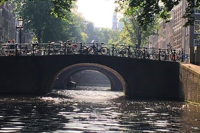 Amsterdam 90-min Private Canal Cruise with Live Guide and Drinks - The UNESCO canal belt and Herengracht’s Golden Bend: the power of trade