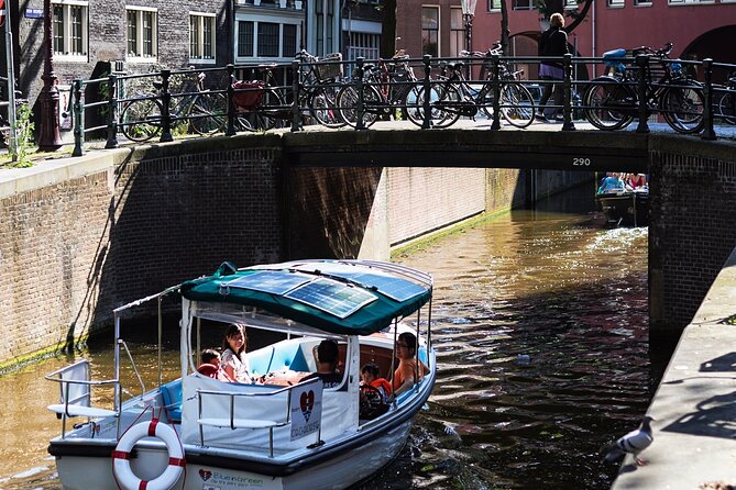 Amsterdam 90-min Private Canal Cruise with Live Guide and Drinks - Drinks, comfort, and how to stay happy if the weather turns