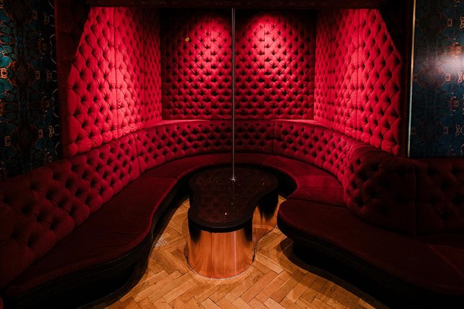 Amsterdam: Behind the Scenes Strip Club Tour with Ex-Sex Worker - VIP rooms and the club’s layout: upscale design with purpose