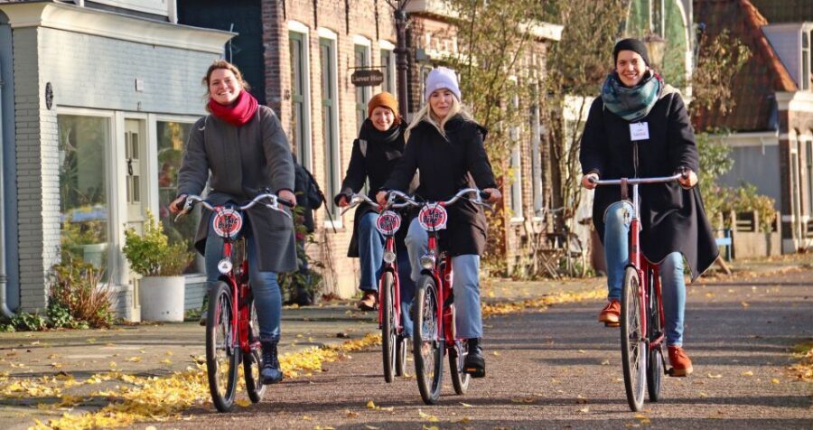 Amsterdam: Bike Tour (Noord) in German or English - Riding toward the dyke and Ijsselmeer-area views