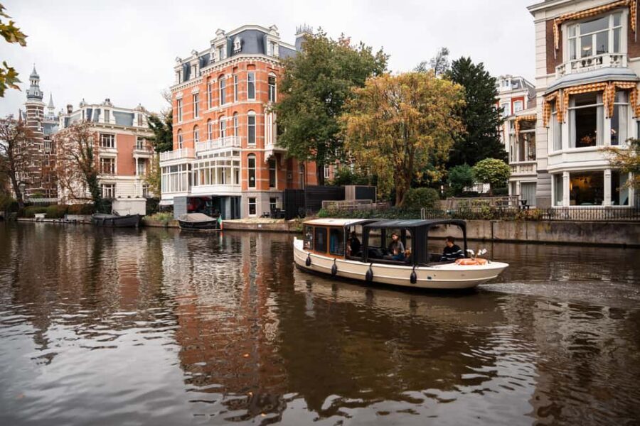 Amsterdam Canal Boat Tour with Live Guide - Why this canal cruise feels like Amsterdam, not a tourist checklist