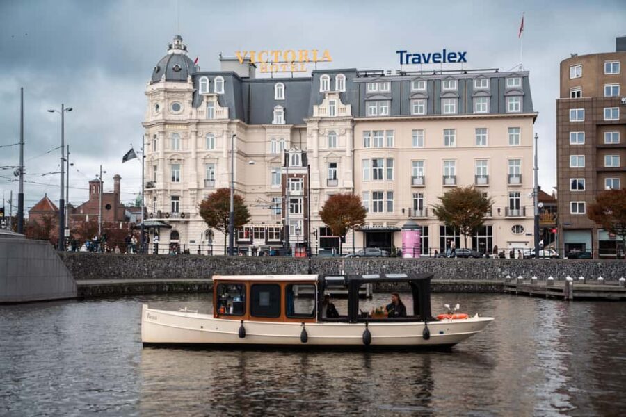 Amsterdam Canal Boat Tour with Live Guide - Your guide: trilingual narration that stays human, not robotic