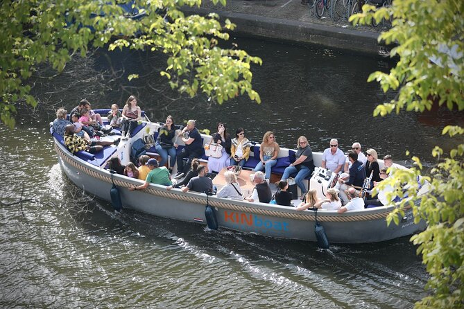 Amsterdam Canal Cruise in Open Boat with Unlimited Drinks Option - Electric Open-Boat with a Clear View (and Fewer Window Problems)