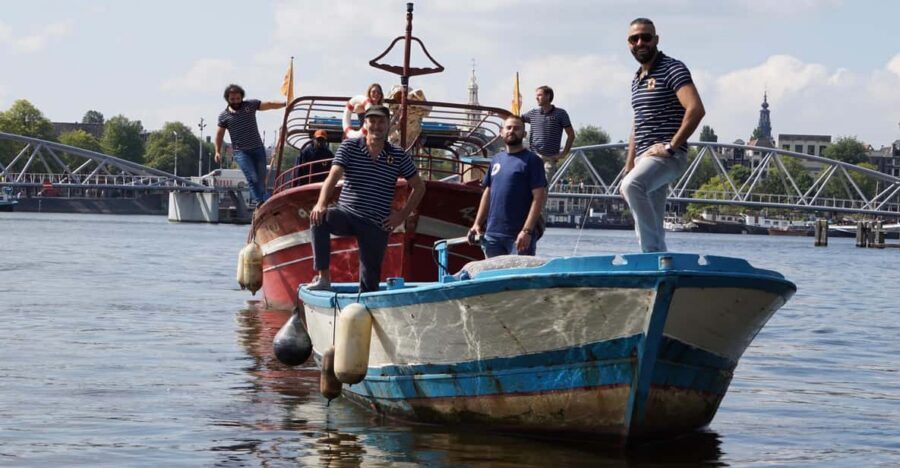 Amsterdam: Canal Cruise on a Wooden Refugee Boat - The wooden boat with a refugee past