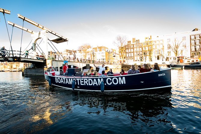 Amsterdam Canal Cruise With Live Guide and Unlimited Drinks - Who should book this Amsterdam canal cruise (and who might skip it)
