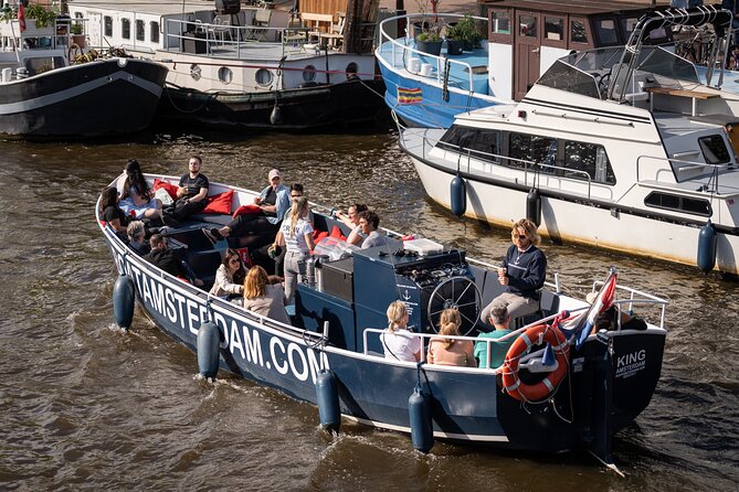 Amsterdam Canal Cruise with Live guide & Two drinks - Central St. - Key things that make this canal cruise worth your time