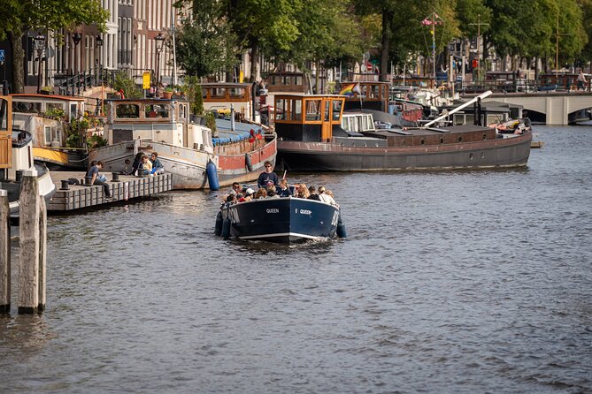 Amsterdam Canal Cruise with Live guide & Two drinks - Central St. - The Old City Centre route: small canals, red-light district area, churches, Central Station