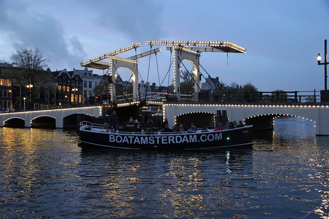 Amsterdam Canal Cruise with Open Bar - Central Station - Red Light District, coffeeshops, and the canal-side reality
