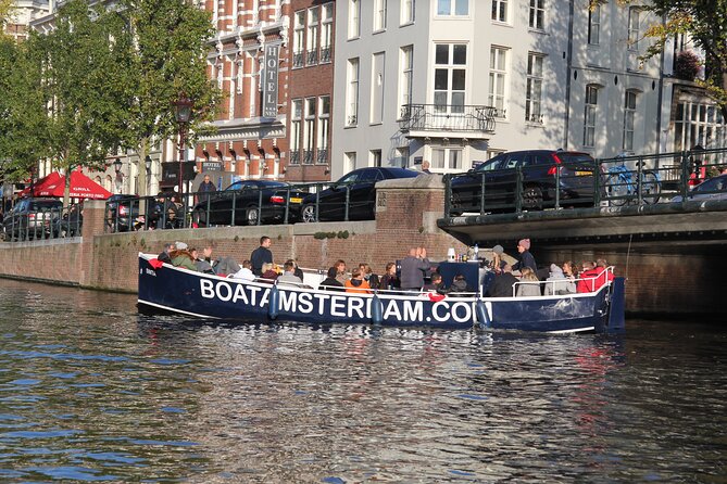 Amsterdam Canal Cruise with Open Bar - Central Station - The Rembrandt connection, the secret church, and old city gates