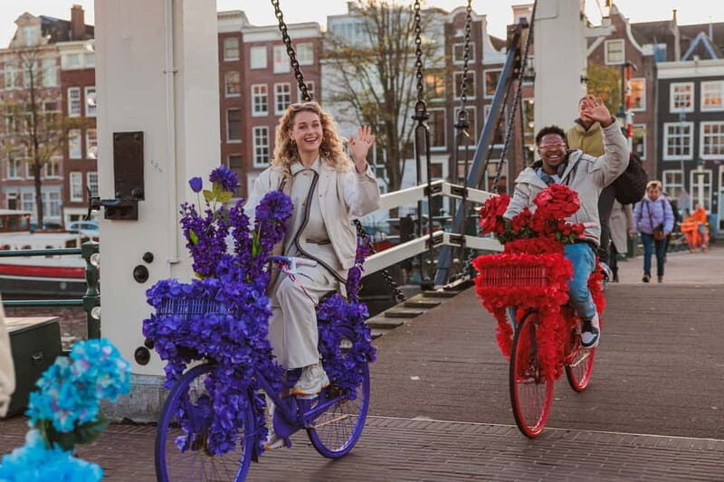 Amsterdam: City Centre, Guided Bike Tour on Flower Bikes - Finding Your Start: Nieuwezijds Voorburgwal 101 and Orange Guides