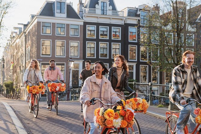 Amsterdam City Top Highlights Guided Bike Tour - Charming Streets, Trendy Cafes, and a Pass by the Red Light District