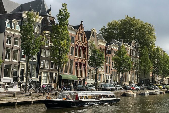 Amsterdam Classic Canal Cruise with Live Guide - Stop-by-stop: from Amstel River to Magere Brug (Skinny Bridge)