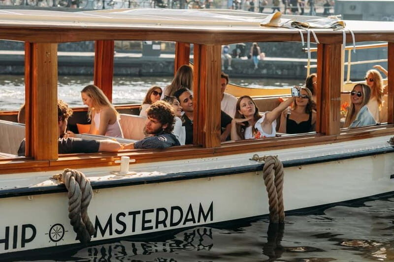 Amsterdam: Classic Saloon Boat Cruise with Cheese & Wine - Drinks rules and group vibe: know the limits before you go