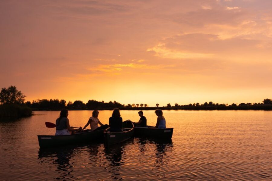 Amsterdam: Dutch Countryside Sunset Canoe Tour - Canoeing past farmhouses, mills, canals, and grazing fields