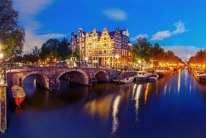 Amsterdam Evening Canal Cruise with Live Guide and Onboard Bar - Rijksmuseum from the water: a skyline-style “preview”