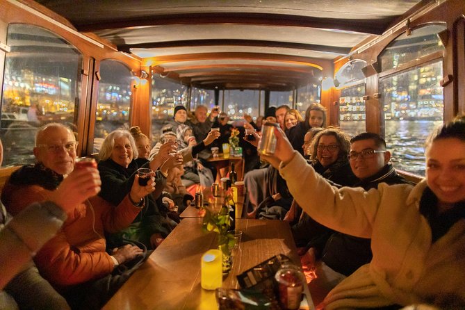 Amsterdam Evening Canal Cruise with Live Guide and Onboard Bar - Magere Brug and the rare bridge sightline trick