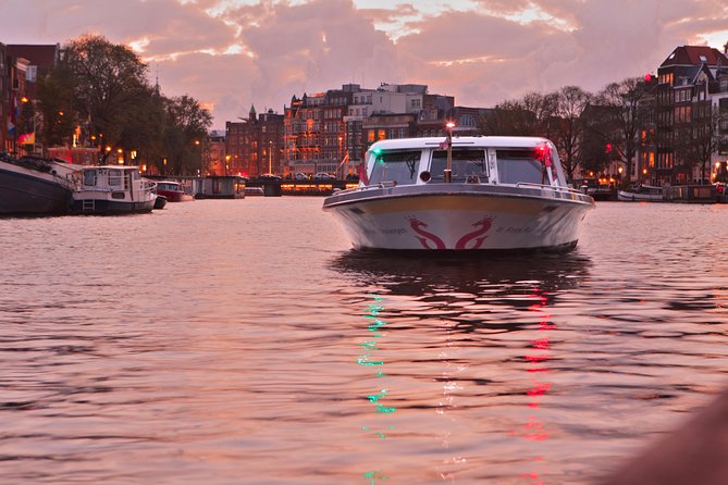 Amsterdam Evening Cocktail Cruise with snacks - Price and Logistics at Damrak: Where This Tour Really Wins