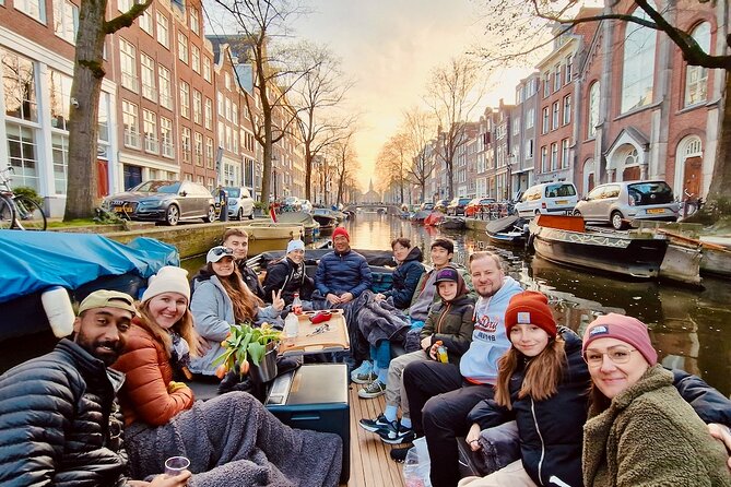 Amsterdam Evening Cruise in Small Group - Amstel River segments: dancing houses and a rare wooden bridge