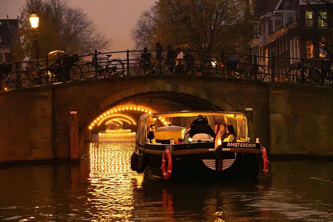 Amsterdam Evening (Sunset) Canal Cruise with optional drinks - Onboard Comfort: Open Boat in Summer, Rain Plan When Weather Turns