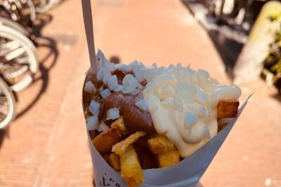 Amsterdam Food Tour with Full Meal & Drinks by Do Eat Better - Where it starts: Munttoren to Bloemenmarkt for an easy first bite