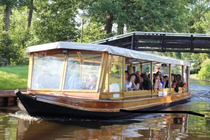 Amsterdam: Giethoorn Tour Scenic Cruise, Cheese & Free Time - Giethoorn canal cruise: the 1-hour part you’ll remember