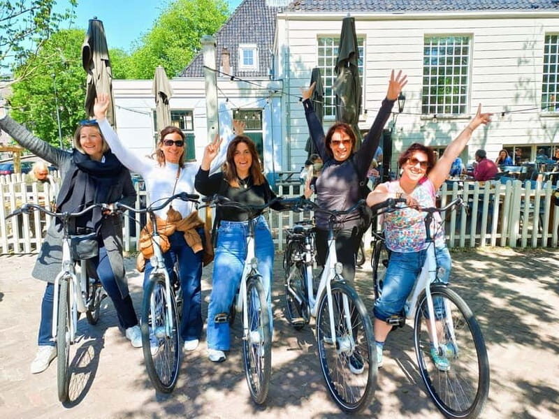 Amsterdam: Guided bike tour in French off the beaten track - Nieuwmarkt Square: The Short Stop That Helps You Understand Where You Are