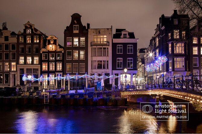 Amsterdam: heated Light Festival Cruise | Incl. Drinks Option - Switching waterways to the Amstel and Hermitage Amsterdam