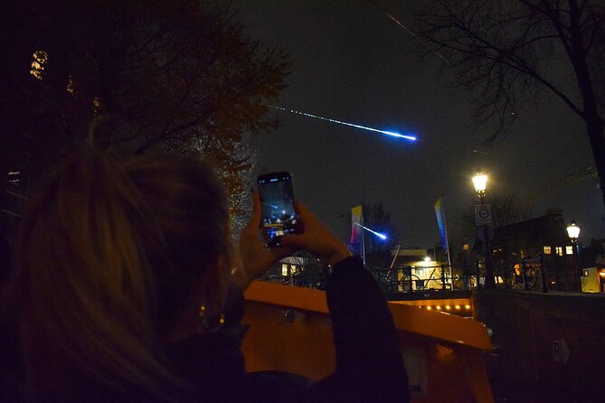 Amsterdam: heated Light Festival Cruise | Incl. Drinks Option - Stopera and Amsterdam Centraal: landmarks with a nighttime angle