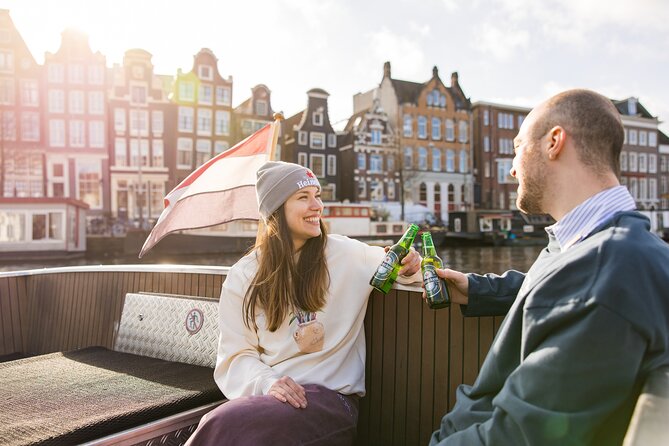 Amsterdam Heineken Cruise with 1 Heineken, Snacks, Live Guide - NEMO, the Amstel river, and Amsterdam’s science-and-water energy