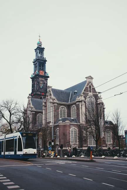 Amsterdam: Hidden Gems and Highlights in DE/EN/IT - Canals at Grachtengordel: crooked houses and a neighborhood shift