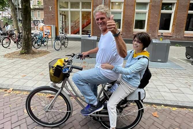 Amsterdam Highlights Bike or E-Bike Tour - Jordaan on two wheels: canals, alleys, and café energy