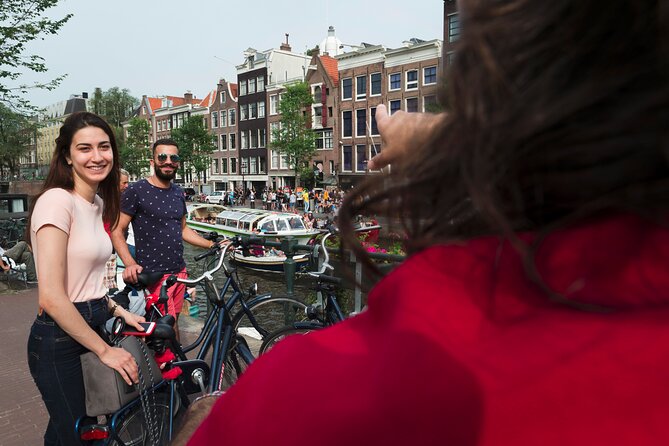 Amsterdam Highlights Bike Tour - Guided in EN/ES/DE/NL - Skinny Bridge and Amstelveld: two great reasons Amsterdam feels romantic