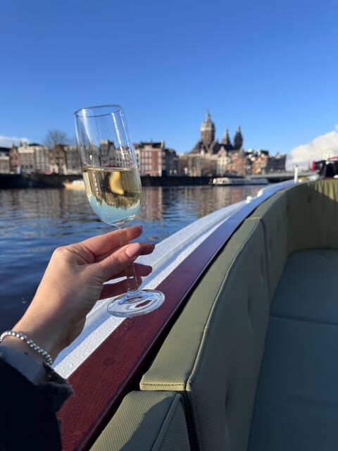 Amsterdam: Historic Boat Cruise with open bar and nibbles - 90 Minutes Through Amsterdam-Centrum: What You See and Why It Works