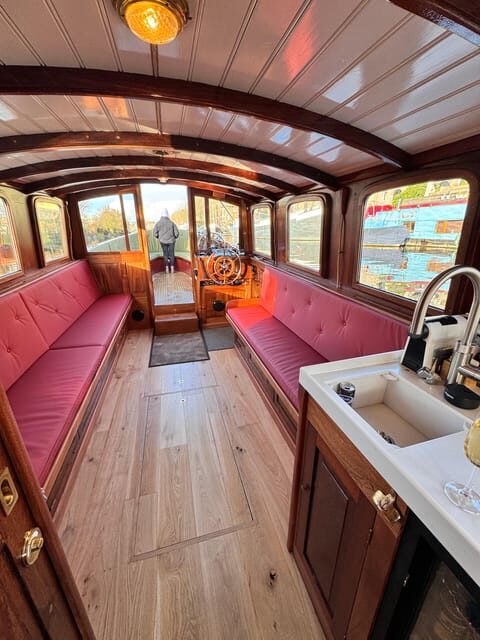 Amsterdam: Historic Boat Cruise with open bar and nibbles - Captain Bow, Jasper, and the Small-Group Energy