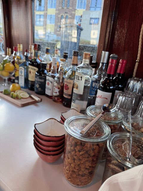 Amsterdam: Historic Boat Cruise with open bar and nibbles - Rain or Shine: Indoor/Outdoor Seating That Actually Helps