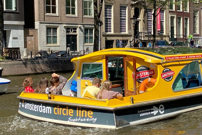 Amsterdam: Historic City Sightseeing Canal Cruise - Houseboats, historic bridges, and canal house facades