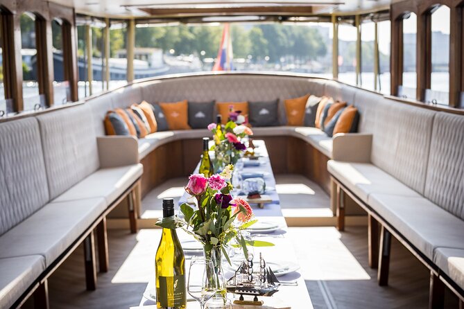 Amsterdam Historic Tour On Classic Saloon Boat - A One-Hour Canal Cruise With Live English Commentary and a Proper Bar
