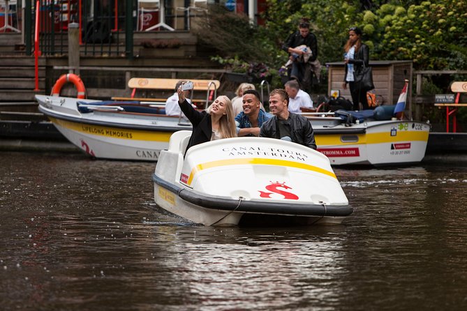 Amsterdam Independent Sightseeing by Pedal Boat - Check-in at the two central piers and the €20 deposit reality