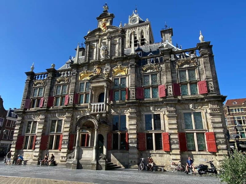 Amsterdam: Kinderdijk, Euromast, Delft and Den Haag Day Tour - Guide quality makes the difference: live English and real-world pacing